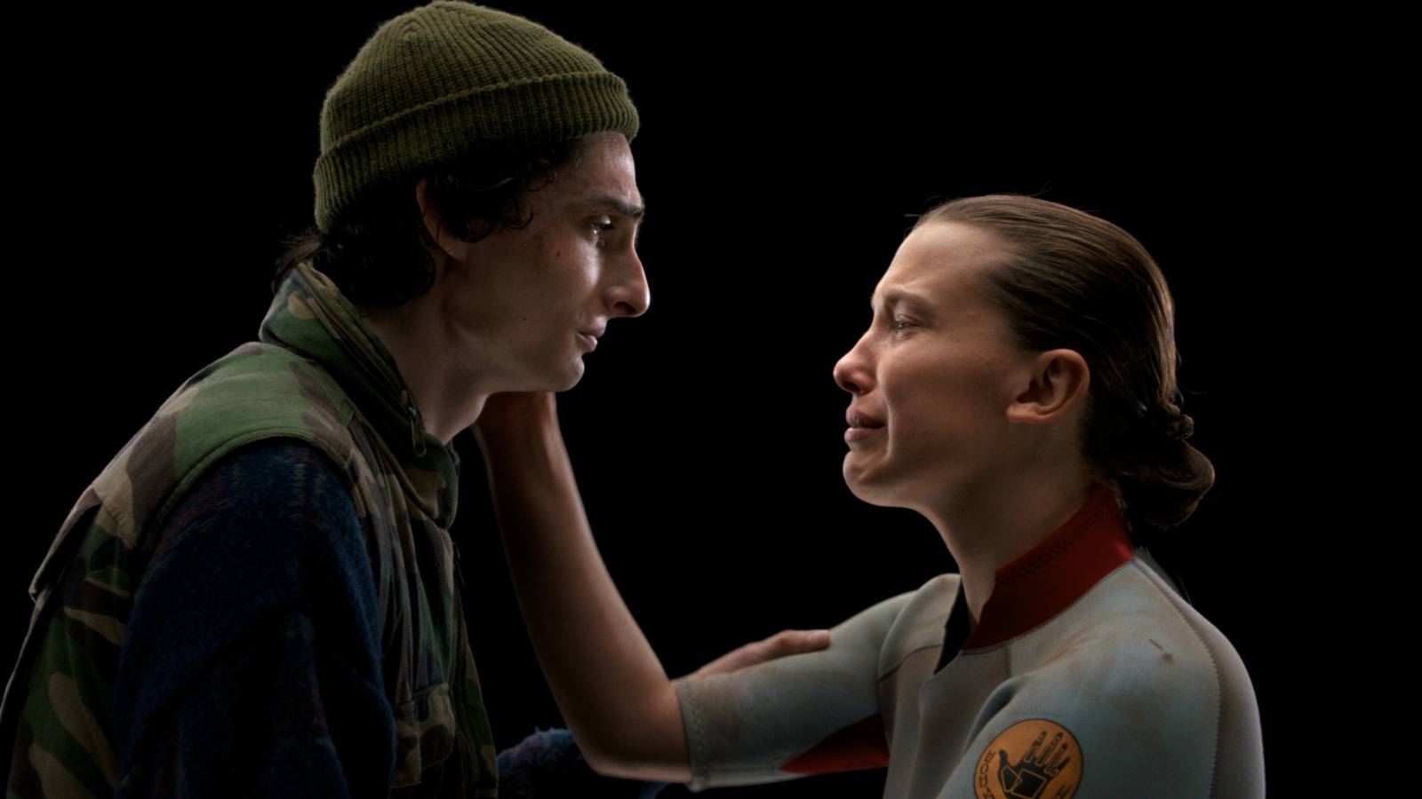 Finn Wolfhard as Mike Wheeler and Millie Bobby Brown as Eleven in Stranger Things Season 5