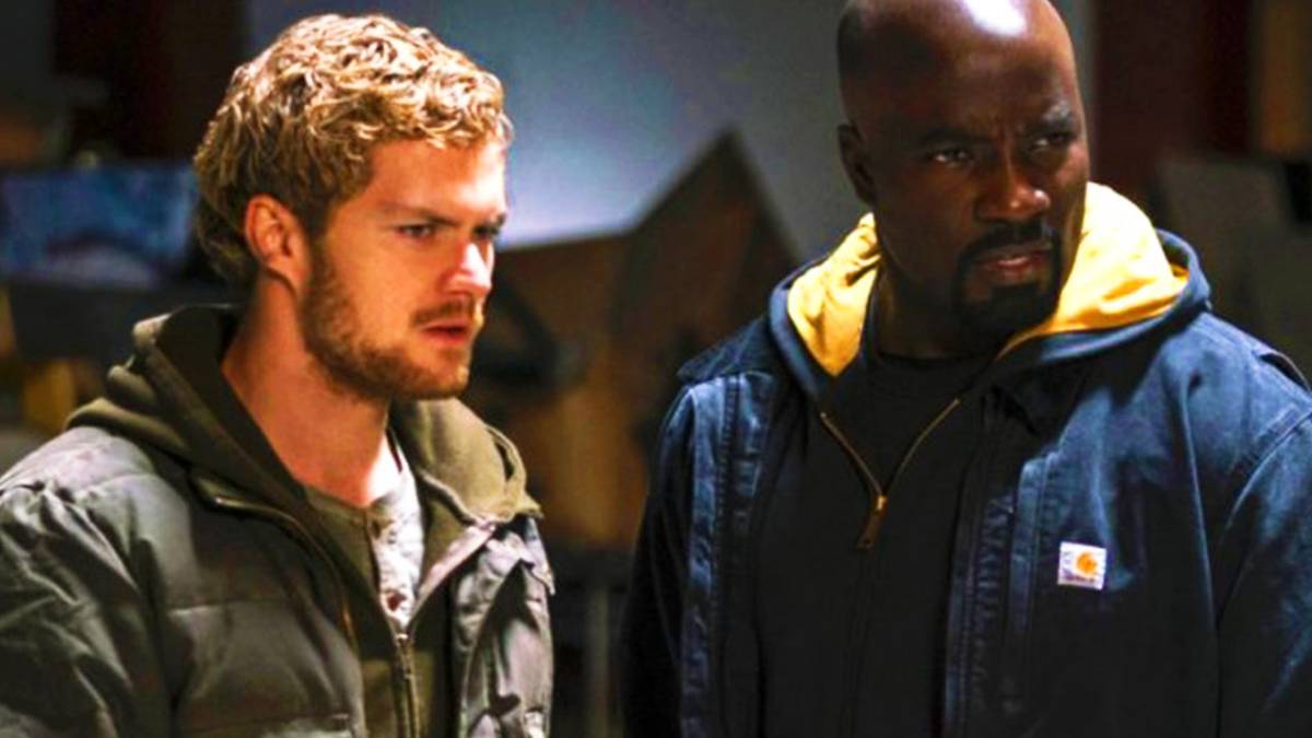 Finn Jones and Mike Colter as Danny Rand's Iron Fist and Luke Cage in Marvel Television's Defende...