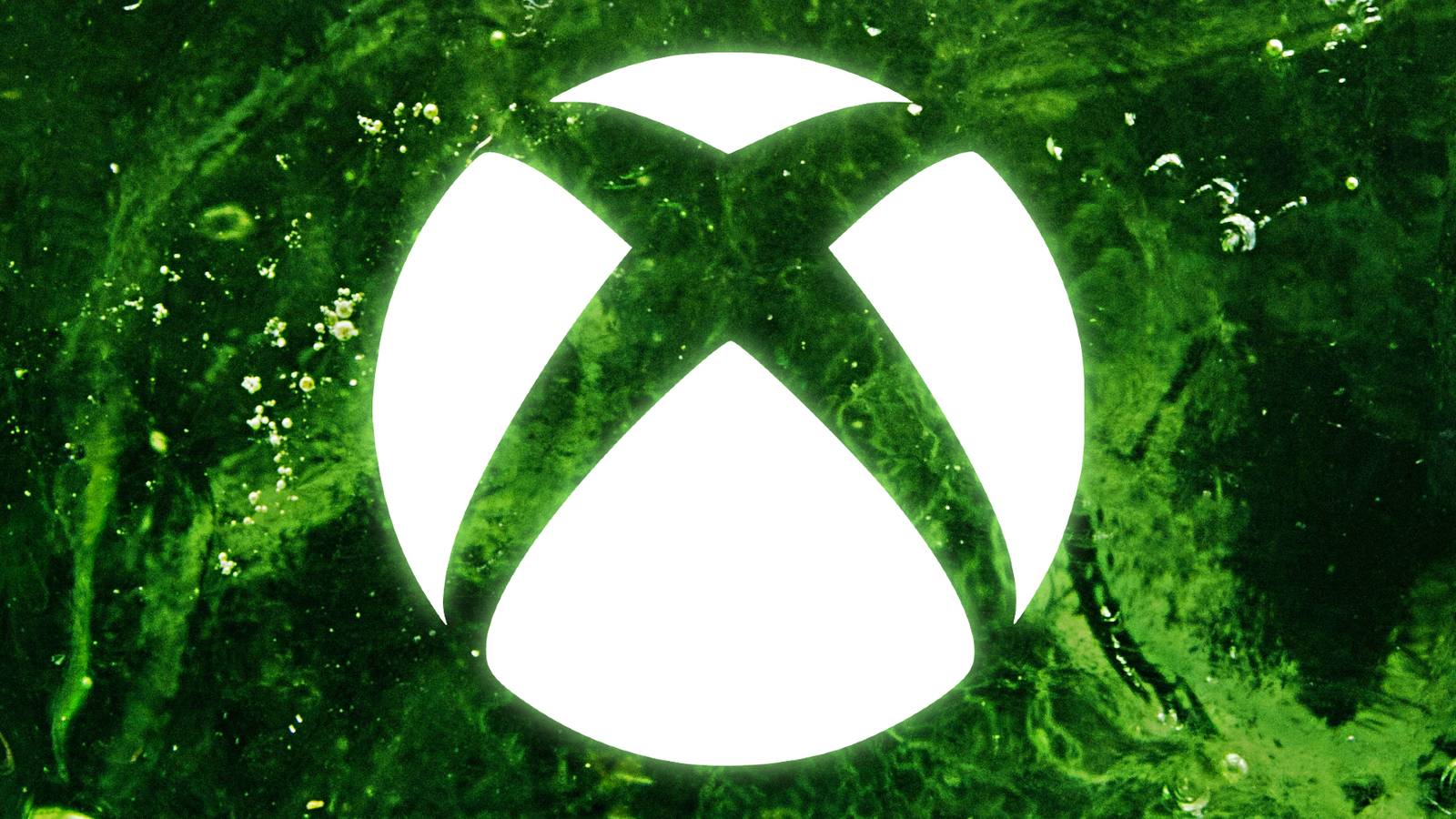 The white Xbox logo is superimposed over green ooze.