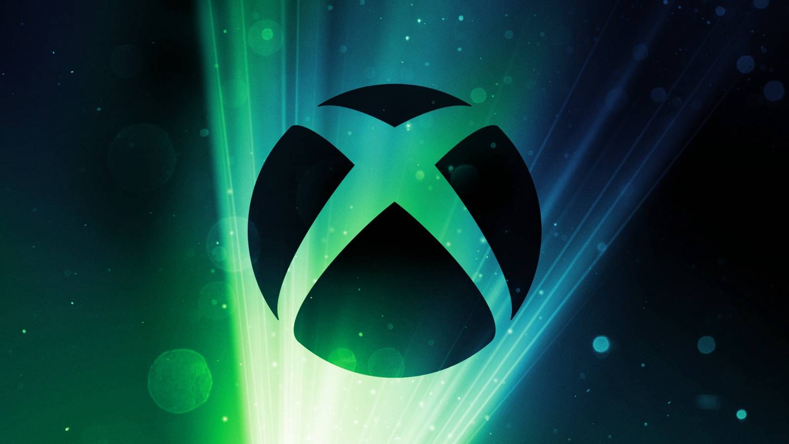 The black Xbox logo has backlights illuminating it in contrast.