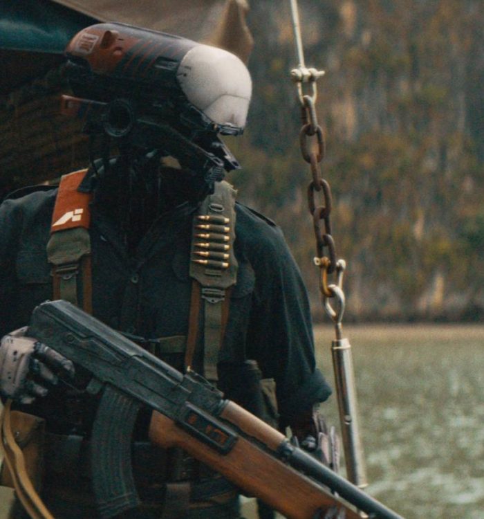 A soldier carrying a gun in The Creator