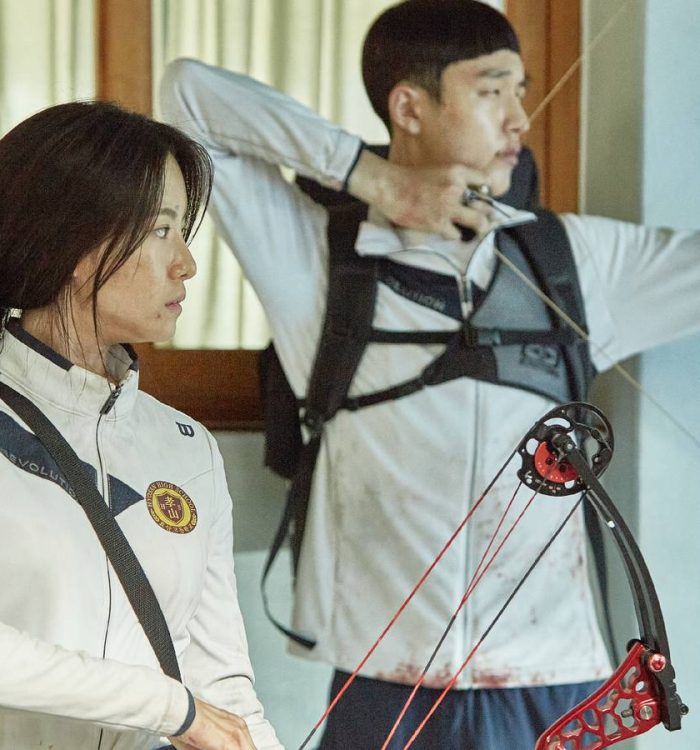 Two students practicing archery in the Netflix K-drama All of Us Are Dead.