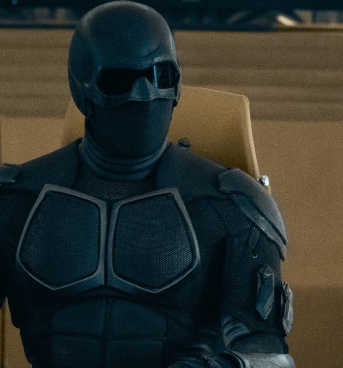 Black Noir sitting as the Seven desk in The Boys