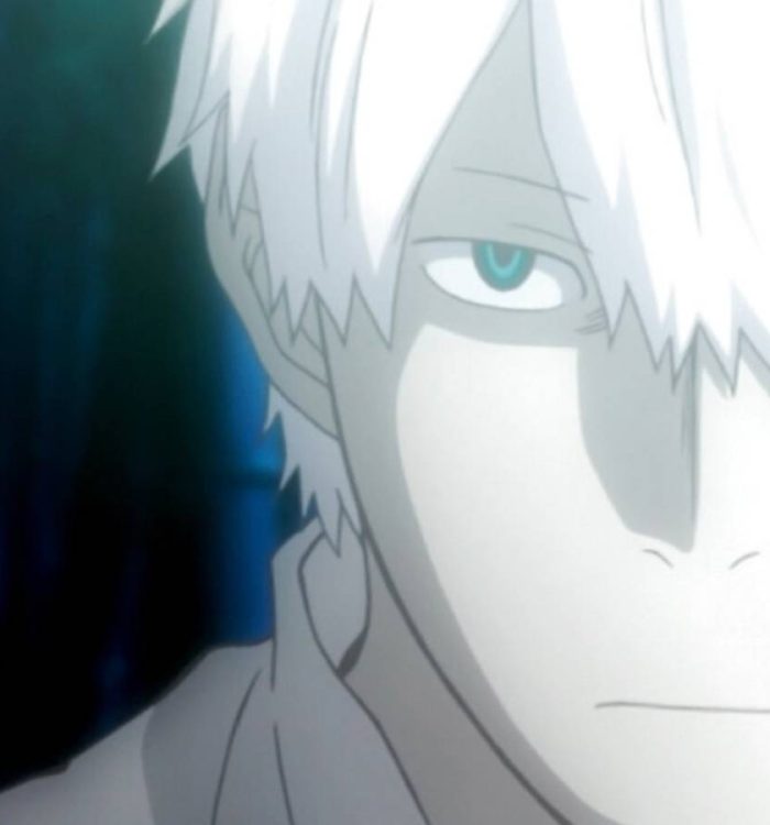 A close-up of Ginko from Mushishi against a forest backdrop.